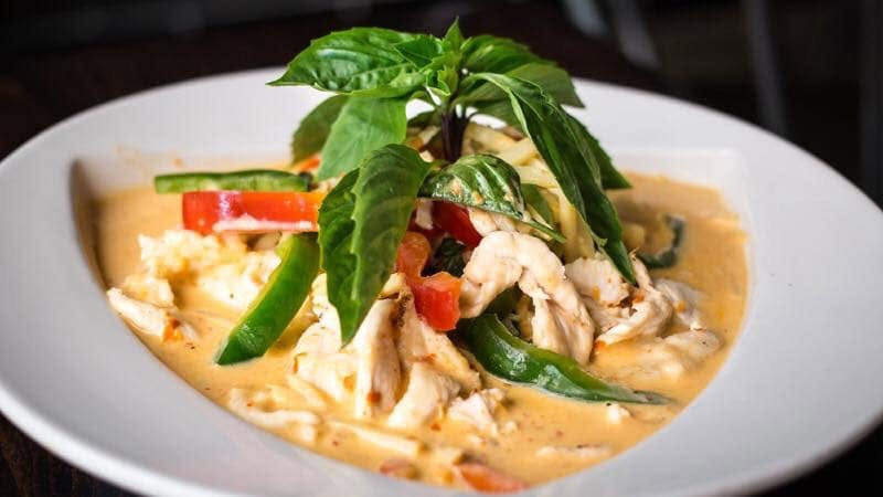 Signature Thai curry with basil